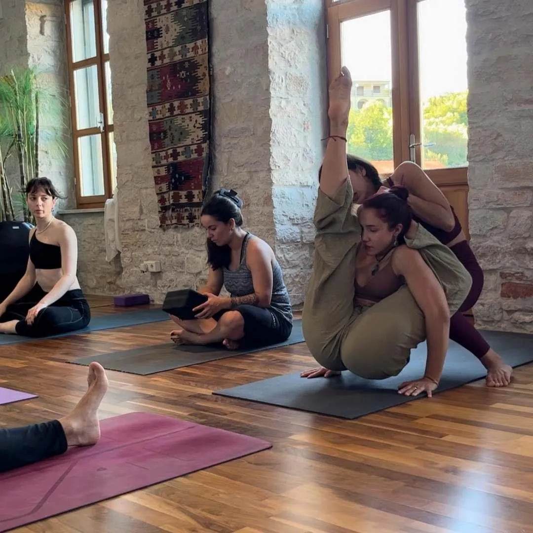 Partner yoga exercise during workshop